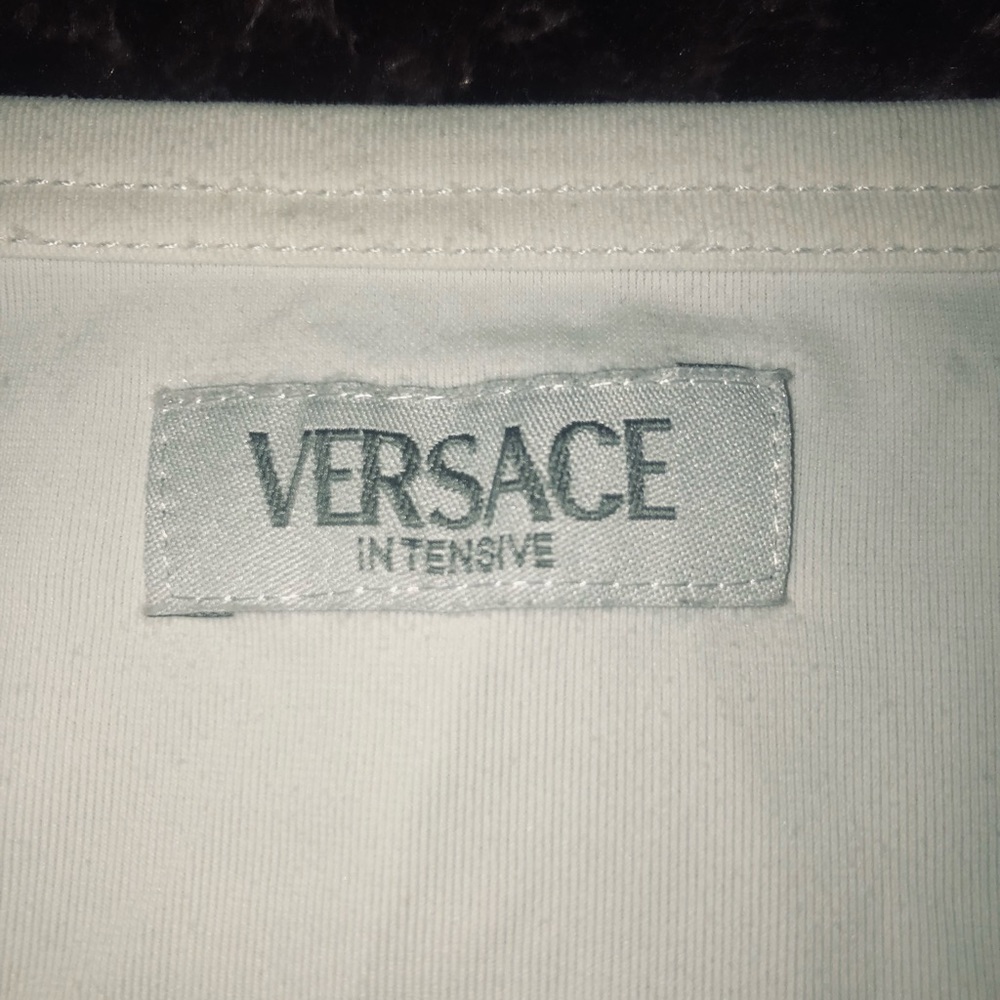 Authentic Versace tshirt unisex,Euro size XL fit M-L. Stretching. Made in Italy.